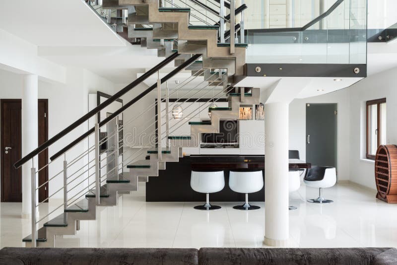 Stairs on the first floor. White marble stairs on the first floor in luxury apartment royalty free stock photos