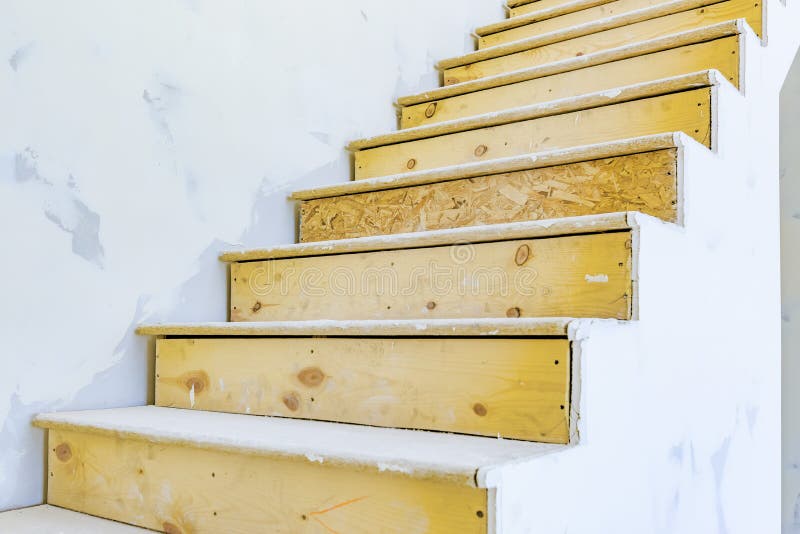 Stairs inside of house under construction in Utah. Stairs inside of house under construction with wood exposed. Utah valley new homes royalty free stock image