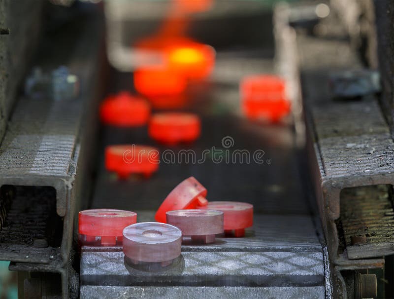 Steel gear hot forging production line. For automotive stock image