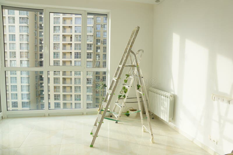 Stepladders during renovation in a new apartment stock image