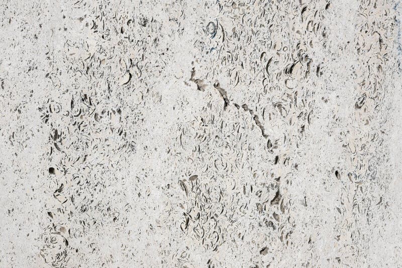 Stone natural slab travertine. Stone slab travertine, natural stone, stone facade, slab of stone, background travertine stock photo