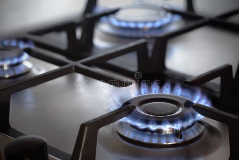 Stove. Gas stove with blue flame royalty free stock photography
