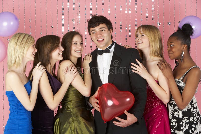 Teenage Girls Looking At Attractive Boy royalty free stock images