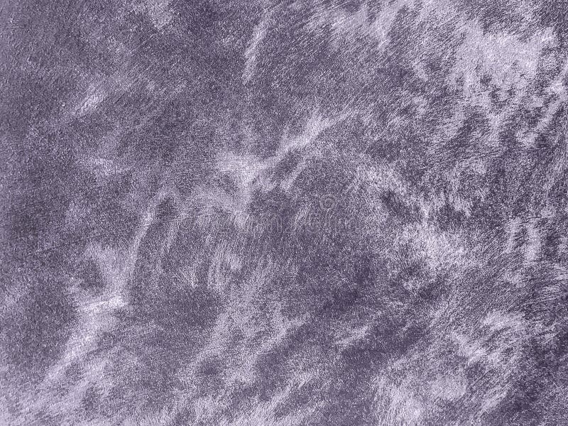 Texture decorative pearl purple plaster. Violet plaster background. Texture decorative dark purple plaster imitating the old peeling wall. Obsolete violet and royalty free stock photos