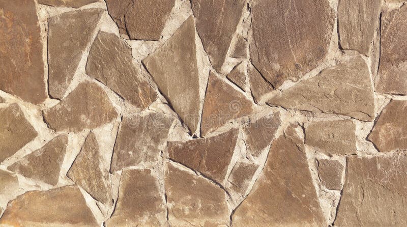 The texture of the finishing stone on the wall. stock photos