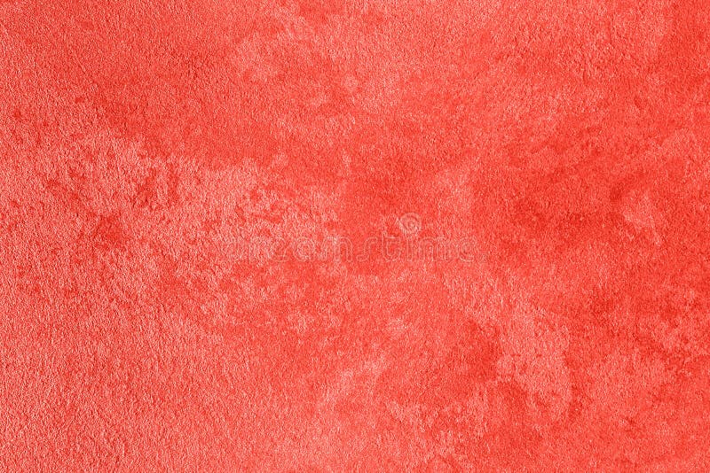 Texture of living coral decorative plaster. Texture of pink or red decorative plaster or concrete. Abstract christmas or new year background for design. Living stock photography