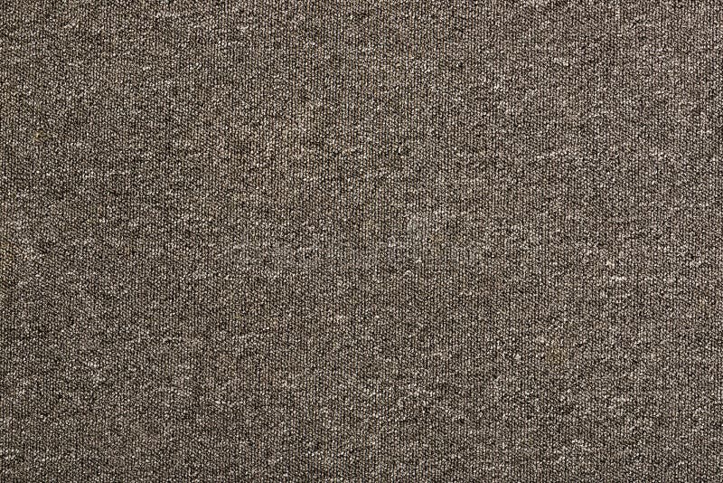 Texture of a simple carpet. Gray background. Texture of a simple carpet. Gray background stock images