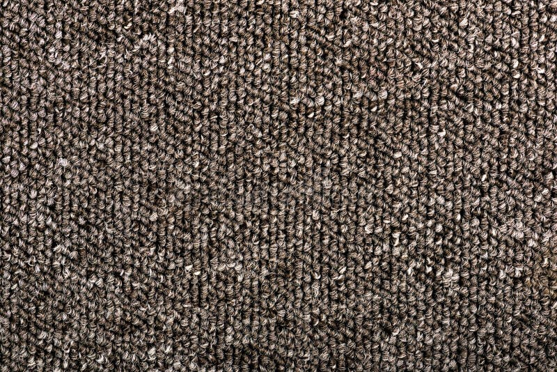 Texture of a simple carpet. Gray background. Texture of a simple carpet. Gray background stock image