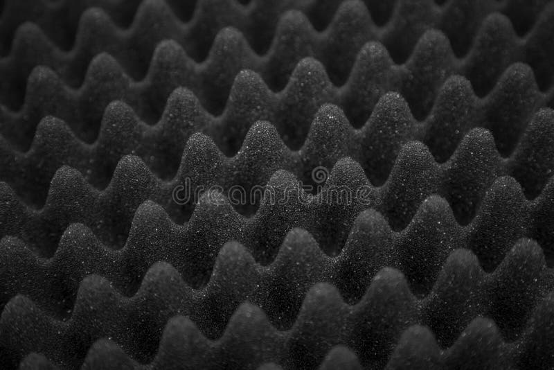 Texture soundproof panel of polyurethane foam. Abstract black rubber foam background royalty free stock photography