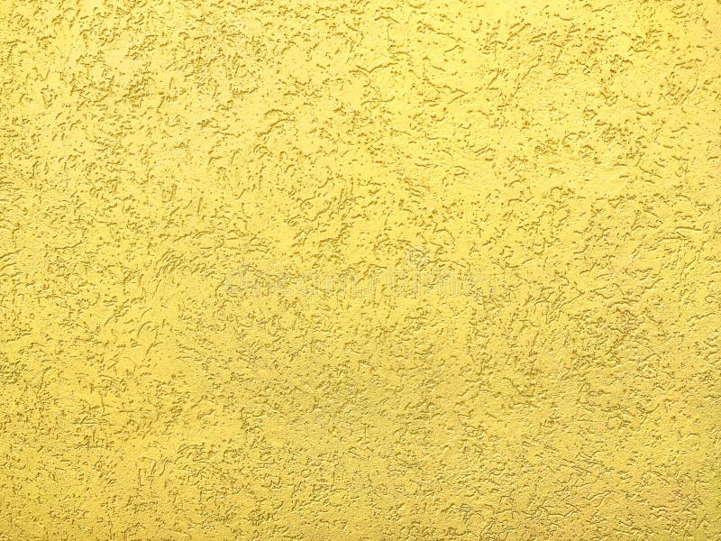 Texture of the yellow plaster bark beetle on the wall. Seamless texture. The texture of the plaster is bark beetle on the wall. Seamless yellow texture royalty free stock photography