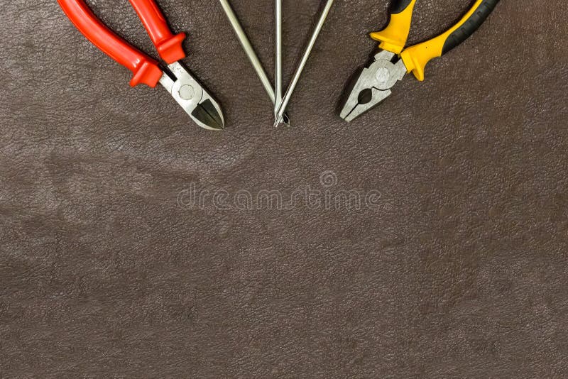 Tools repair fasteners set of screwdrivers and nippers plastic handle bright decoration base design poster stock photography