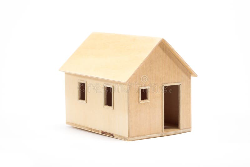 Toy wooden house model. On white background stock photo