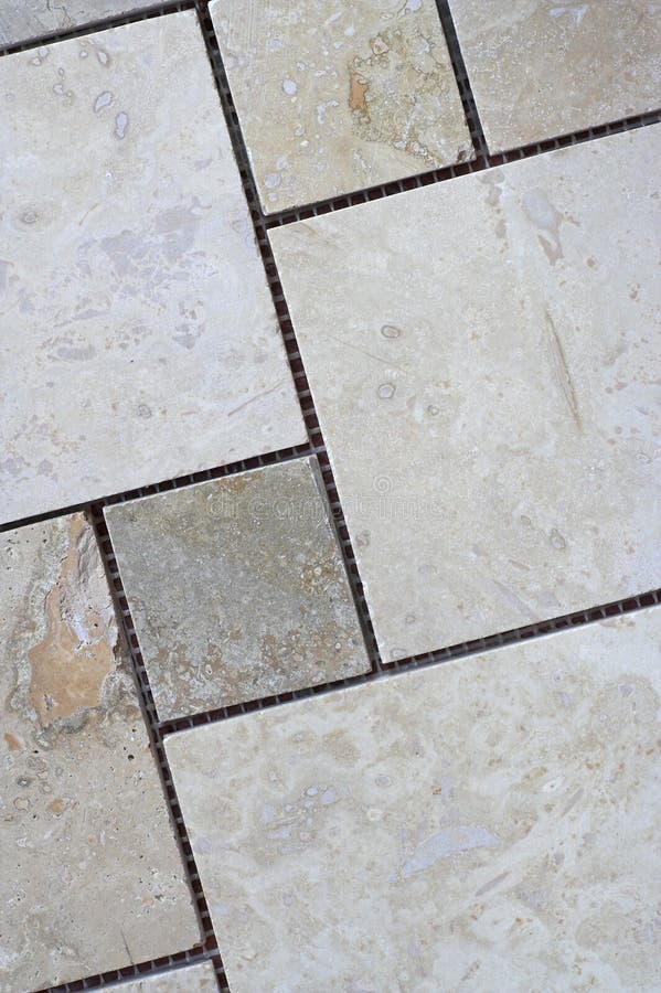 Travertine Tiles. A sheet of natural travertine floor tiles ready for grouting stock images