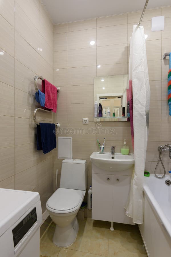 The uncoupled elements in the interior of a small combined bathroom. The uncoupled elements in the interior of a small combined  bathroom stock image