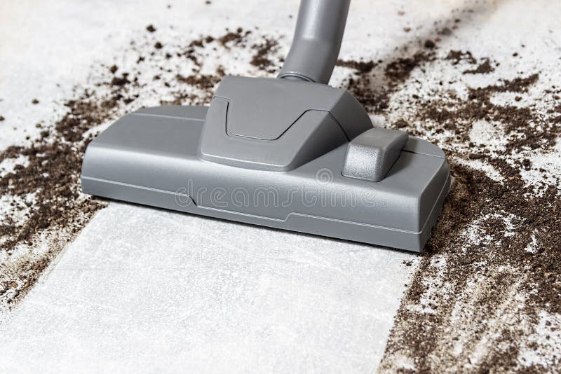 Vacuum cleaner. Carpet hoover. Cleaning. Dirty floor royalty free stock photo