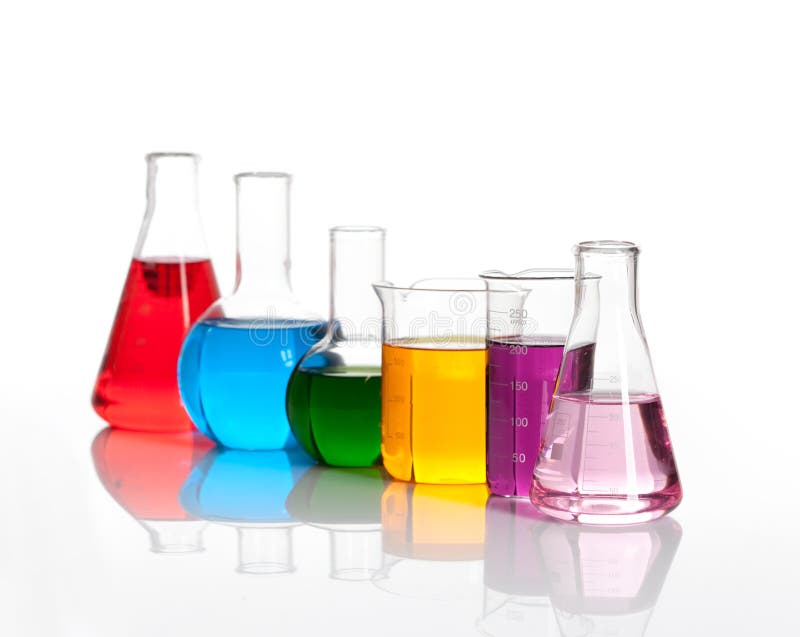 Various glass flasks with a colored liqiuds stock photography