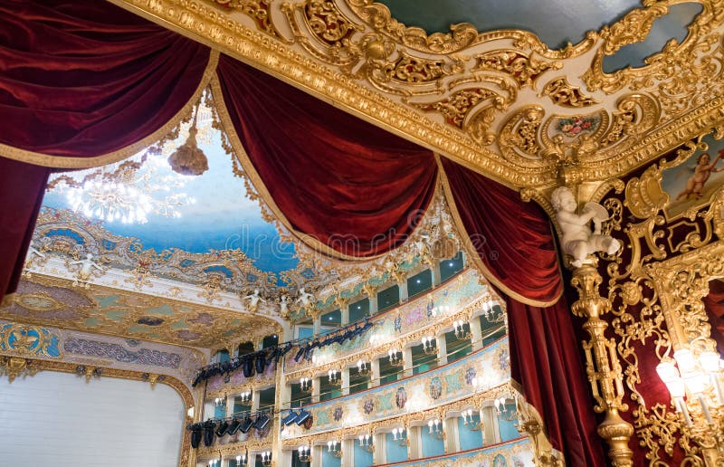 VENICE - APRIL 7, 2014: Interior of La Fenice Theatre. Teatro La. Fenice, The Phoenix, is an opera house, one of the most famous and renowned landmarks in the stock photography