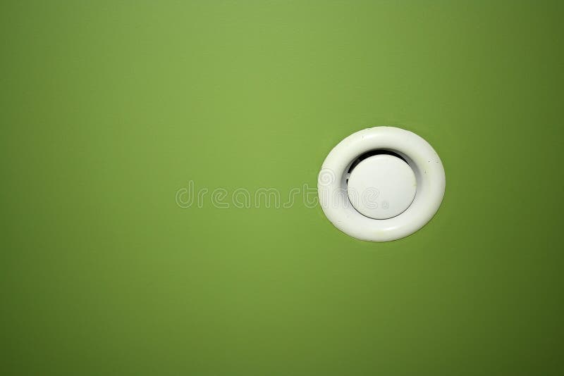 Ventilation. Built into a green ceiling, texture, background stock photo