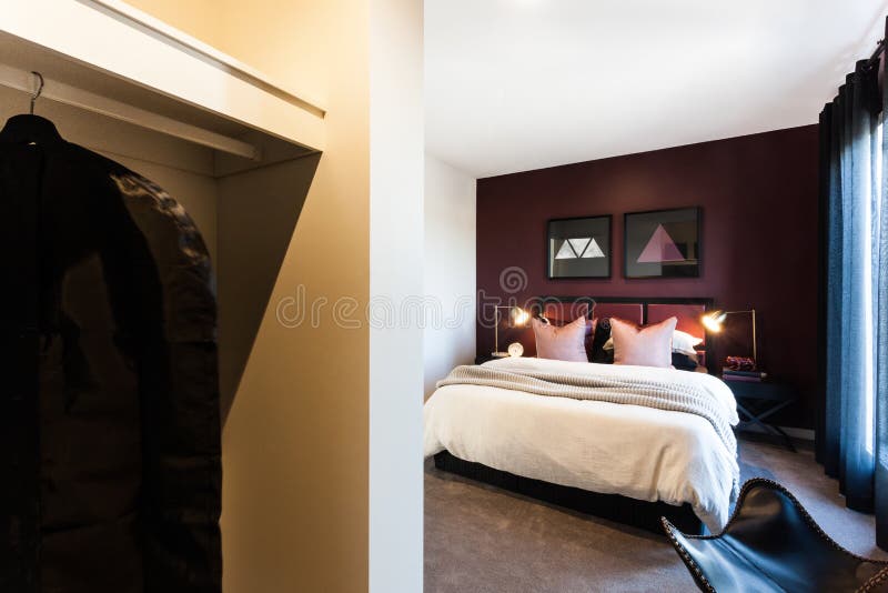 View of modern bedroom from the dressing room royalty free stock photo