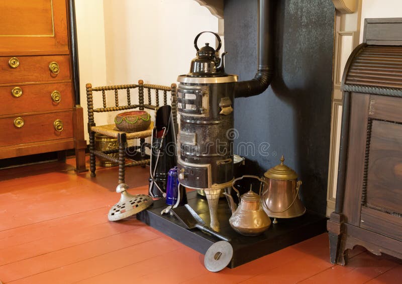 Vintage fireplace in an old dutch house stock photo