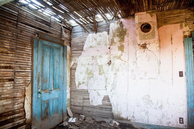 Vintage Old Room. Paint peels from an abandoned farm house room royalty free stock images