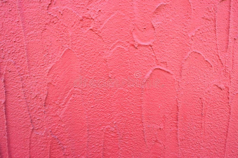 Wall of a facade with rough plaster. Wall of a facade with rough red plaster royalty free stock image