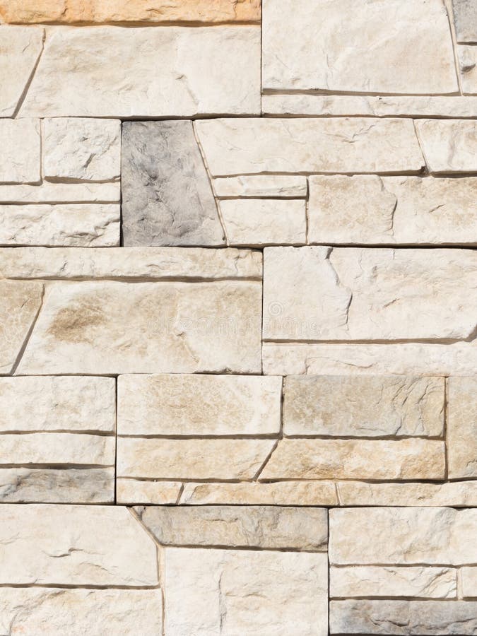 Wall made of artificial stone stock photography