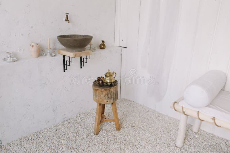 Wash basin vintage. Retro stoned sink. romantic vintage bathroom interior. Design loft  with wood and concrete. Wash basin vintage. Retro stoned sink. romantic royalty free stock photography