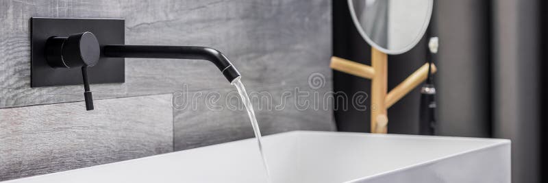 Washbasin with wall mounted tap royalty free stock image