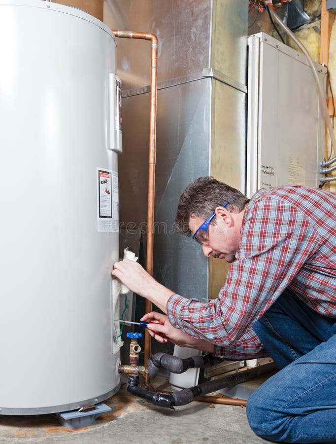 Water heater maintenance royalty free stock image