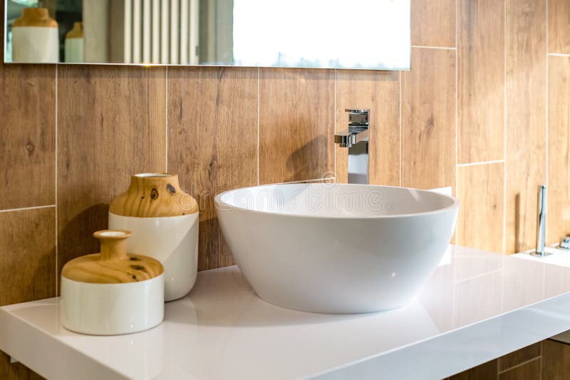 Water tap sink with faucet in expensive loft bathroom.  stock photo