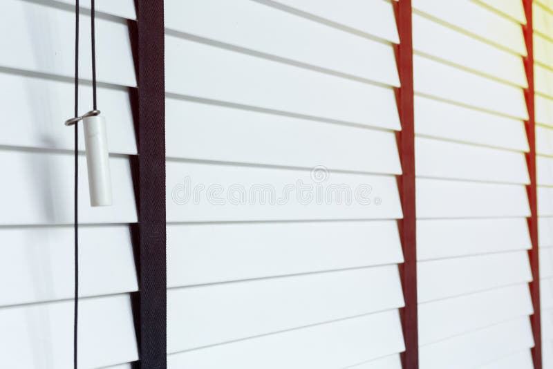 White blinds on window, design interior of bedroom. In modern house stock image