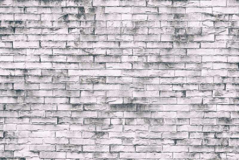 White brick wall background in rural room. Loft style wall use for background or texture royalty free stock image