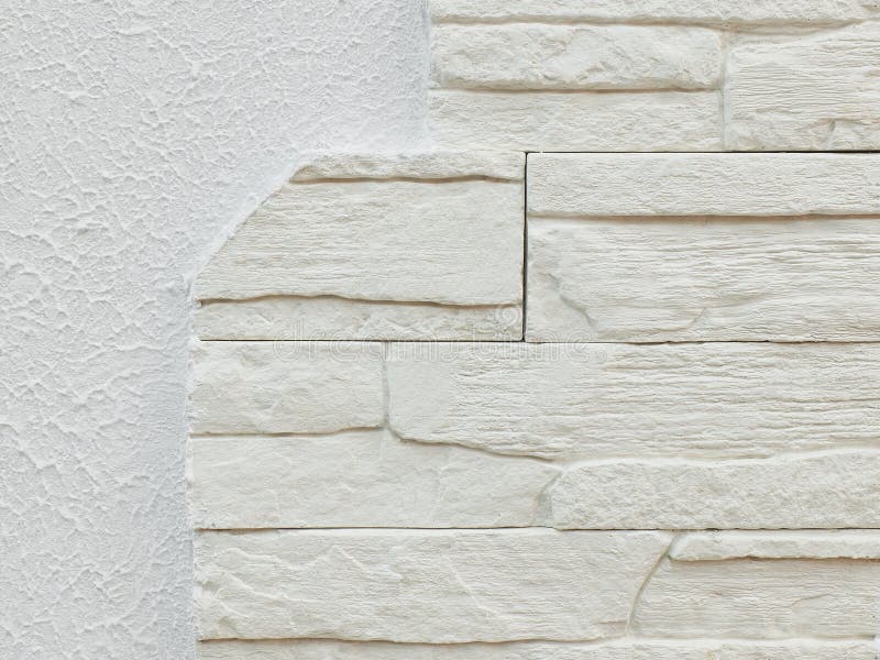 White gray stucco plaster texture and white decoration stones bricks background pattern. Imitation stone wall interior decorative. Element. White brick wall royalty free stock photos