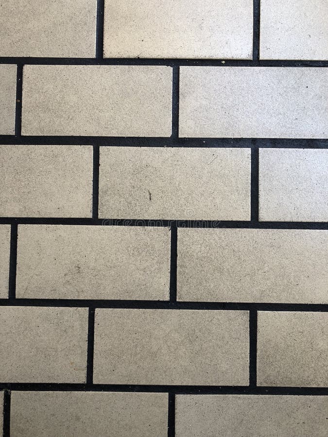 White. Tile with black grout in order stock image