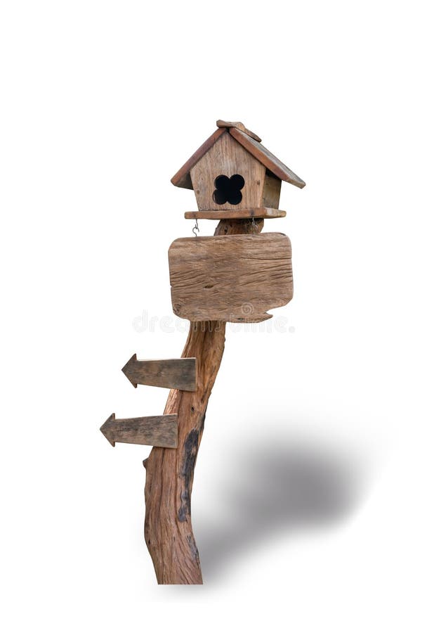 Wooden bird house on wooden sign isolated on white background. File contains a clipping path royalty free stock photos