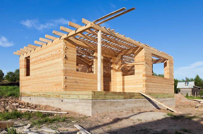 Wooden house. Construction of a new wooden house royalty free stock images