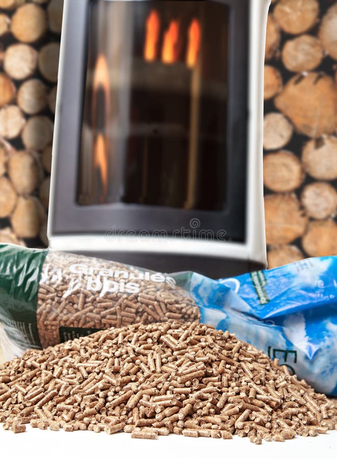 Wooden stove. Pellets and bag stock photography