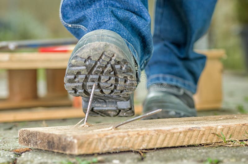 Worker with safety shoes stock photos