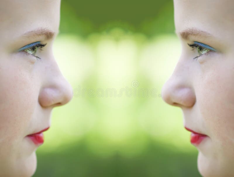 Young attractive teenager girl face side view with makeup royalty free stock photography