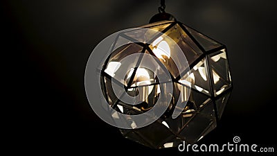 Beautiful chandelier in the loft hanging from the ceiling on a dark background. Close-up stock video footage