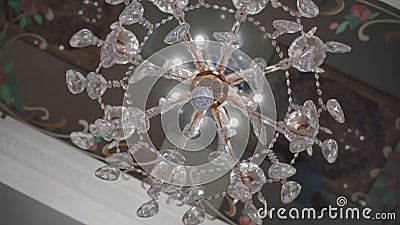 Beautiful chandelier with mirrored ceiling.  stock footage
