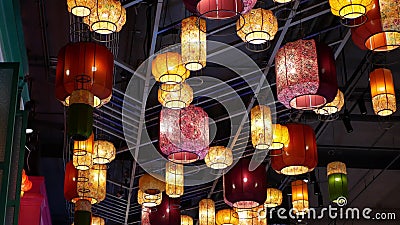 Beautiful colorful lanterns hanging on the ceiling of the ground floor floating market in Iconsiam shopping mall. Iconsiam ,Thailand -Nob 18,2019:  Beautiful stock footage