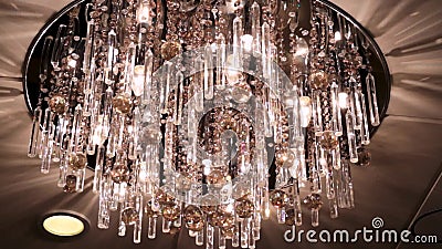 Chandelier in the apartment. Scene. A beautiful chandelier on the ceiling of the apartment. elegant chandelier on the. Chandelier in the apartment. A beautiful stock video footage