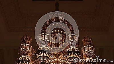 Huge luxurious oriental chandelier. A very beautiful lamp decorates the ceiling.  stock video footage