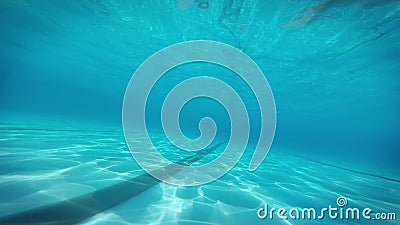 Slowmotion Underwater walking on the pool bottom stock video