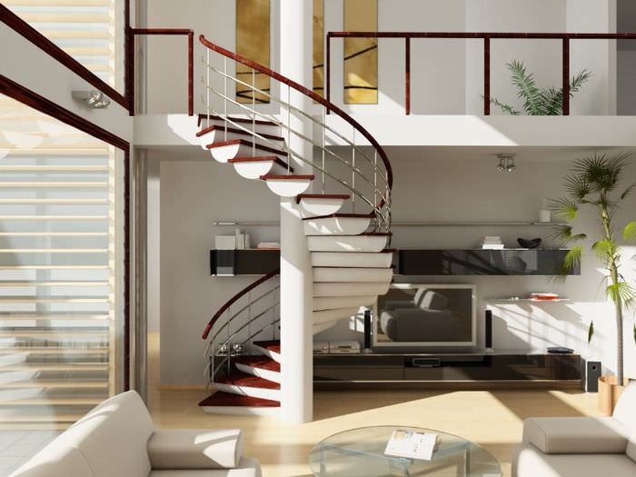 Винтовая лестница с оригинальными ступенями в интерьере жилого помещения