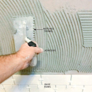 Step 2. Spread wall adhesive 